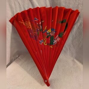 Vibrant Red Handheld Fan with Dragon Design